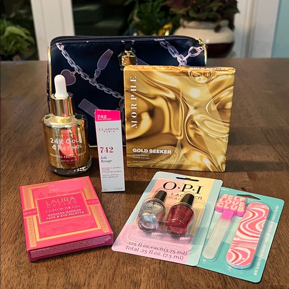 Laura Geller Other - Name brand face and nail bundle includes makeup bag.